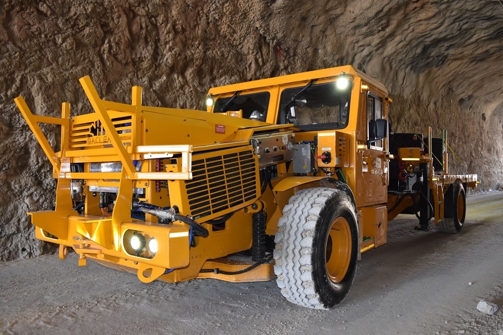 A picture of MEDATech's EV Boom Truck. A battery powered electric mine truck